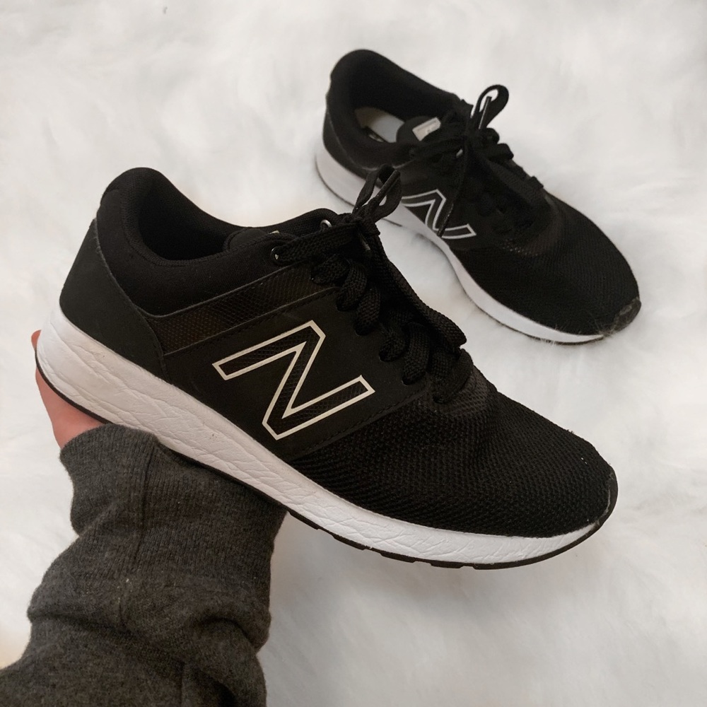 Black New Balance athletic sneaker